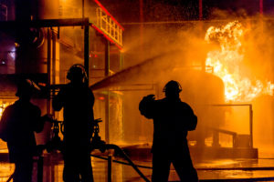 Firefighters putting out a fire